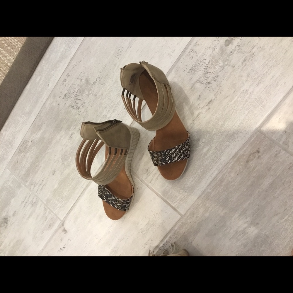 Ankle strap, zip up back, Aztec front strap. NWOB